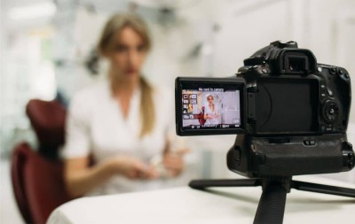 dentist making a video in her office