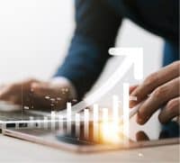 The 3-D image illustrates growth, guided by the digital dental marketing guide, with an arrow rising on the bar graph.