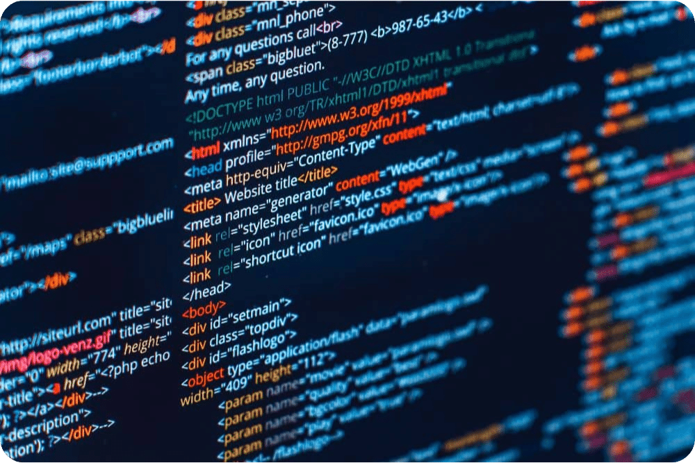Close-up of computer screen displaying colorful lines of HTML and CSS code.