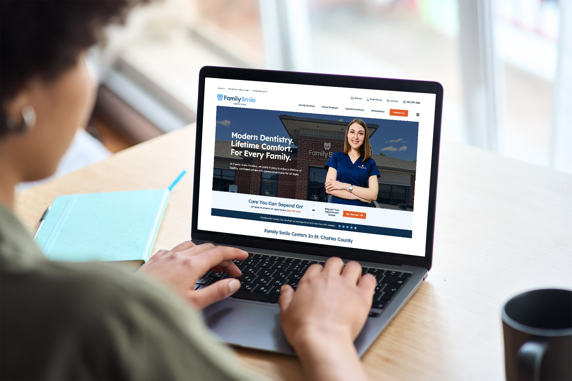 Person viewing dental website with SEO-driven content on laptop for marketing purposes.
